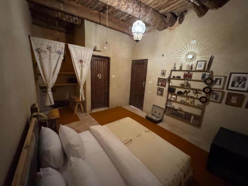 Ένα ή περισσότερα κρεβάτια σε δωμάτιο στο Tatrbent Siwa تاطربنت سيوة