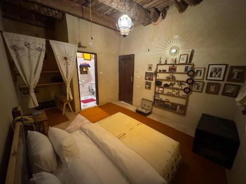 Ένα ή περισσότερα κρεβάτια σε δωμάτιο στο Tatrbent Siwa تاطربنت سيوة