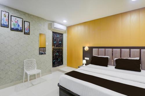 Postel nebo postele na pokoji v ubytování Super Hotel O Medical College Basaratpur Gorakhpur