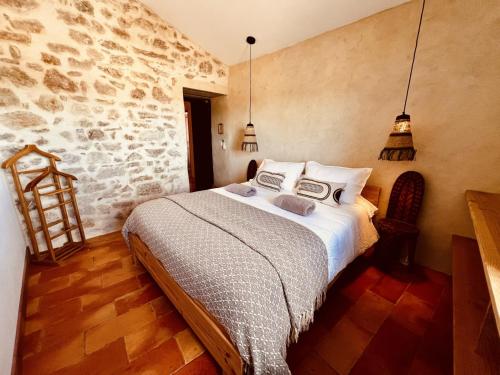 Postel nebo postele na pokoji v ubytování LA GRANGE - Maison de vacances - Entre lac et montagne