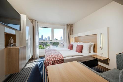 Katil atau katil-katil dalam bilik di Best Western Plus Welcome Hotel Frankfurt