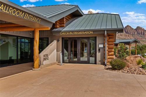 a building with a sign that reads albuquerque entrance at Hotel De Novo Springdale, Tapestry Collection by Hilton in Springdale