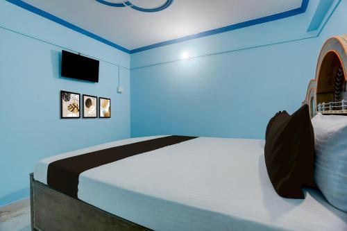 Ένα ή περισσότερα κρεβάτια σε δωμάτιο στο Hotel O Sawariya Guest House
