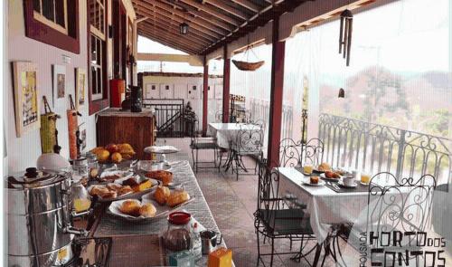 Restaurant ou autre lieu de restauration dans l'établissement Pousada Horto dos Contos