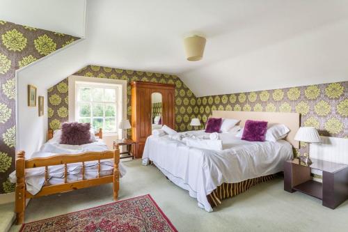 Postel nebo postele na pokoji v ubytování Argyll House