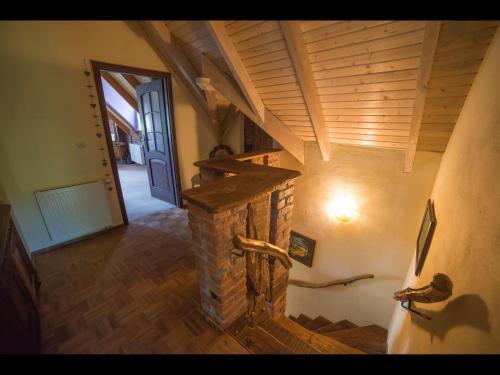 an overhead view of a room with a stone fireplace at Zagroda u Macieja in Ustka