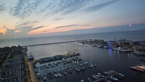 an aerial view of a harbor with boats in the water at Sea Towers Luxury Apartment in Gdynia
