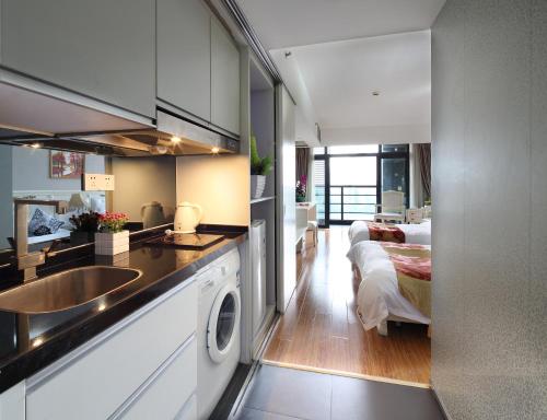 Η κουζίνα ή μικρή κουζίνα στο Mihua Times You Apartment