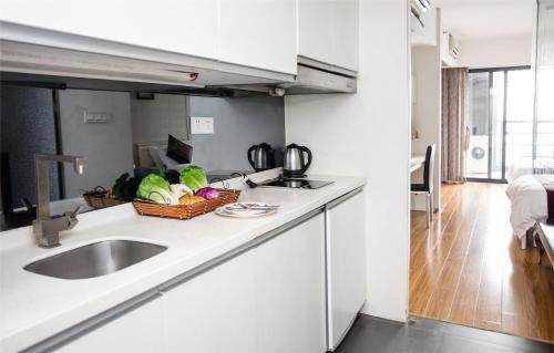 Η κουζίνα ή μικρή κουζίνα στο Mihua Times You Apartment