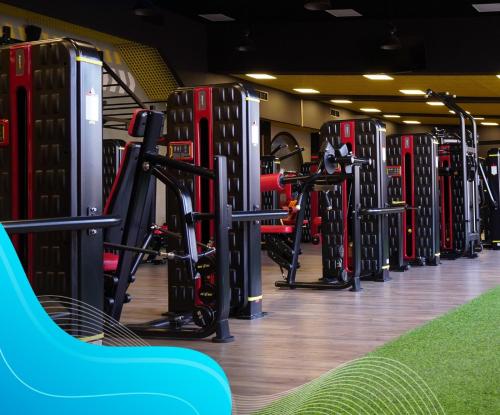 Fitness centrum a/nebo fitness zařízení v ubytování Forest Cottages Hotel EVN