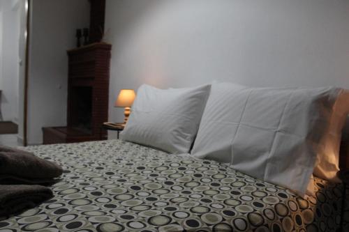 Ένα ή περισσότερα κρεβάτια σε δωμάτιο στο Fay's Apartments