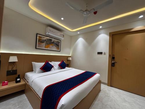 a bedroom with a large bed in a room at Zip By Spree Hotels R Group in Kota