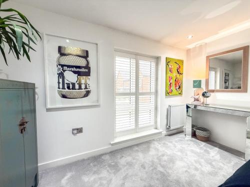a living room with a jar on the wall at Elegant 2BR Retreat- Longbridge Shops, Rail & Hills in Longbridge