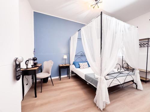 Ένα ή περισσότερα κρεβάτια σε δωμάτιο στο Sister's House