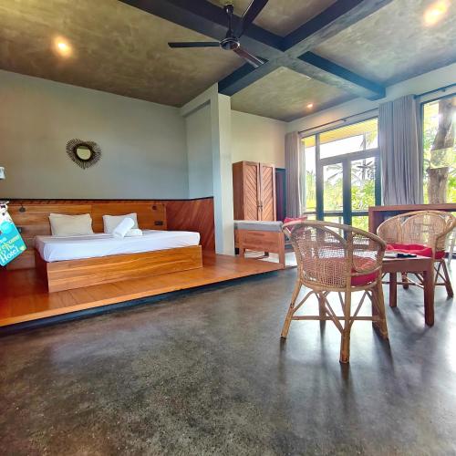 Ένα ή περισσότερα κρεβάτια σε δωμάτιο στο Mango Tree Villa Bentota