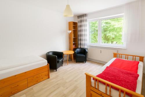 Ένα ή περισσότερα κρεβάτια σε δωμάτιο στο Private Room in 2 rooms flat, 15mins direct U-Bahn to Hbf