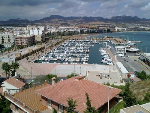 a harbor with a bunch of boats in the water at Apartamento con vistas a toda la bahia in Puerto de Mazarrón