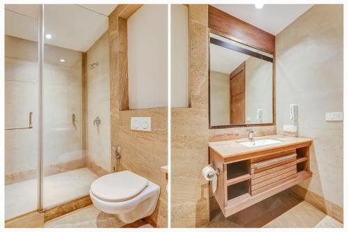 une salle de bain avec toilettes, lavabo et douche dans l'établissement Super Townhouse Chhatarpur Near Metro Park, à Jāmb