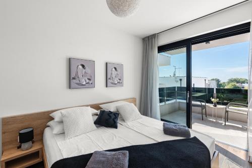 Postel nebo postele na pokoji v ubytování Villa Mattia