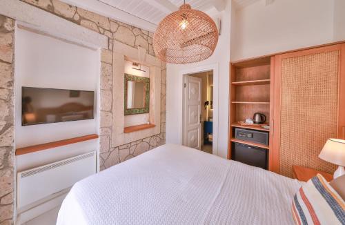 Cama o camas de una habitación en Alacati Balbadem Hotel