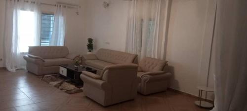 Гостиная зона в La Résidence Hoteliere la Maison Blanche Afanayo