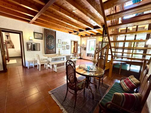 a large living room with a table and chairs at Waterfront Villa Magnolia in Kotor