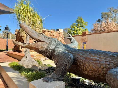 a statue of a statue of a crocodile at Albury Paddlesteamer in Albury