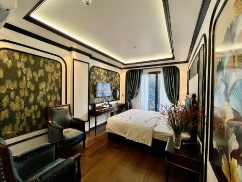 Ένα ή περισσότερα κρεβάτια σε δωμάτιο στο Royal Hotel Thanh Trì