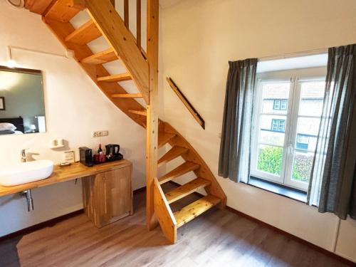 Kuchyň nebo kuchyňský kout v ubytování B&B en Vakantiewoningen 't Wienhoes