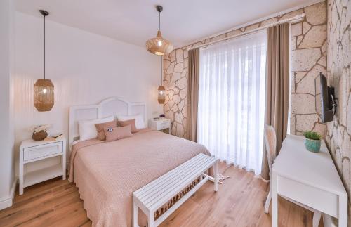 Cama o camas de una habitación en Alacati Balbadem Hotel