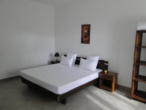 Ένα ή περισσότερα κρεβάτια σε δωμάτιο στο HOTEL H1 ISALO