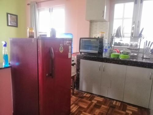Una cocina o zona de cocina en Bed & Breakfast With Home Theatre