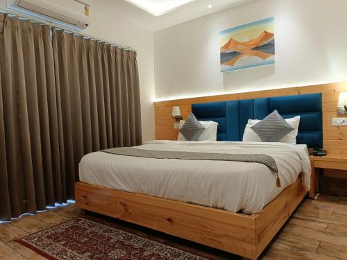 Cama o camas de una habitación en Heryk Hillview Hotel