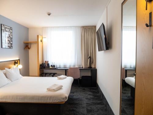 B&B HOTEL Wrocław Centrumにあるベッド