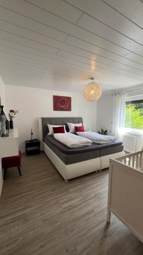 a bedroom with a large bed in a room at Bachnixe 1 in Seebach