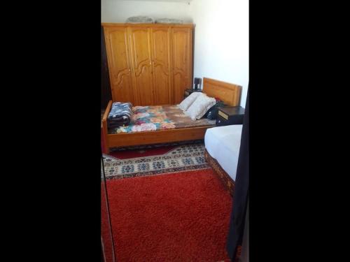 Ένα ή περισσότερα κρεβάτια σε δωμάτιο στο Diabat hostel