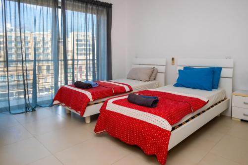 Cama o camas de una habitación en Bay View Apartments
