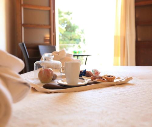 Letto o letti in una camera di Alghero Resort Country Hotel & Spa