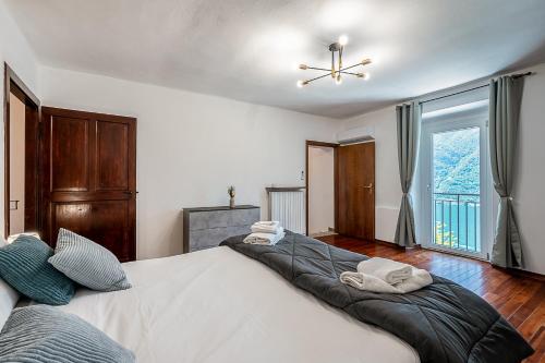 Ένα ή περισσότερα κρεβάτια σε δωμάτιο στο New duplex with lake view, 2 terraces