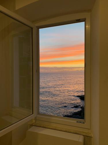 a window with a view of the ocean at Mistral in Riomaggiore