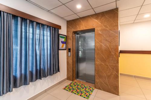 Imagen de la galería de Treebo Urban Nest, en Ernakulam