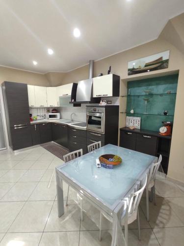 Kuchyň nebo kuchyňský kout v ubytování HH IMPERO Locazione Turistica