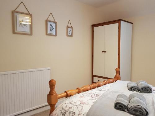 Ένα ή περισσότερα κρεβάτια σε δωμάτιο στο The Goldsmiths Apartment