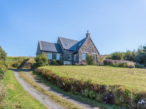a house on a hill with a dirt road at La Bergerie in Stein