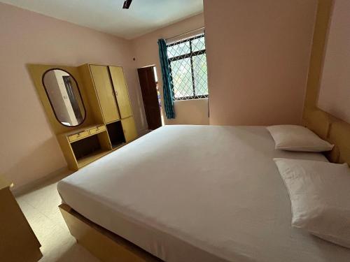 Ένα ή περισσότερα κρεβάτια σε δωμάτιο στο Casa guest house