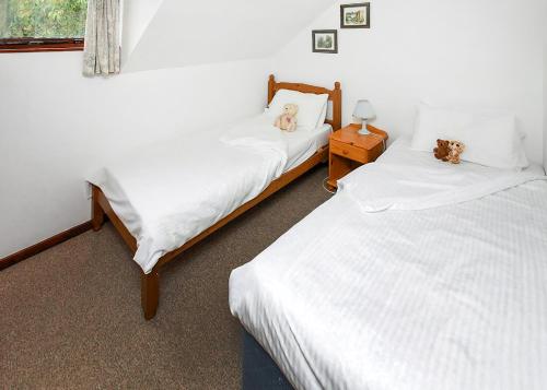 Postel nebo postele na pokoji v ubytování Kenegie Manor