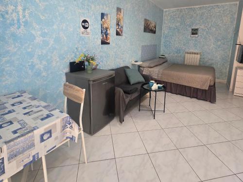 a hospital room with two beds and a table at Appartamento sofí in Fiumicino