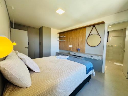 Postel nebo postele na pokoji v ubytování Oásis do Atlântico Home Club - Apto Vista Mar para 4 pessoas