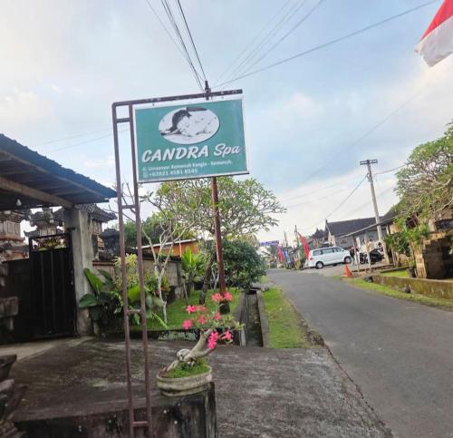 a sign for aarma shop on the side of a street at TebaFamily in Blahbatu