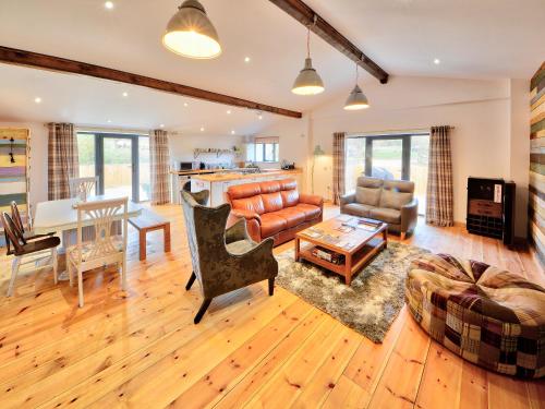 a living room with a couch and a table at Madeline Angevine - Ukc3208 in Newbridge